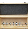 Eight Piece Pro Picture Frame Router Bit Set with carbide blades displayed in a wooden storage case, ready for woodworking projects.