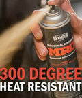 Person spraying Industrial High Solids Spray Paint With Boss Coverage For MRO Jobs Flat White Finish Rust And Weather Resistant Coating.