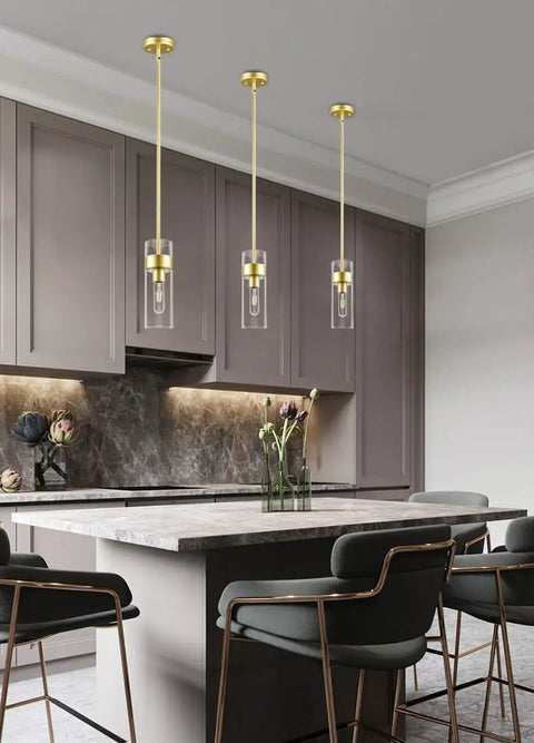 Modern Brass Pendant Light Over Kitchen Island With Clear Glass Shade, Industrial Metal Ceiling Fixture, Adjustable Rods, Kitchen