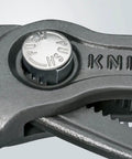 Close-up of push button adjustment on Cobra Water Pump Pliers With Seven And A Quarter Inch Length, V Jaw Style.