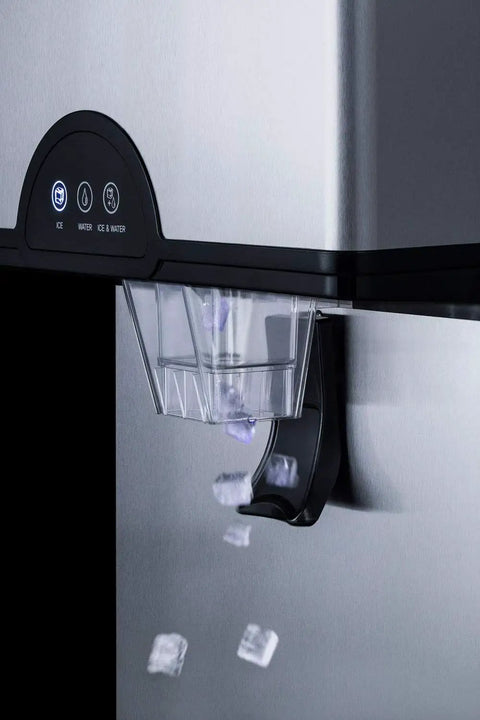 Smooth Operator Commercial Countertop Ice And Water Dispenser producing nugget ice, detailed view of ice chute and control panel.
