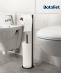 Free Standing Black Toilet Paper Holder Stand With Reserve Storage beside toilet in bathroom setting.