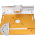 Front view of orange aluminum router table insert plate with opening, side measurement rulers, and white mounting block