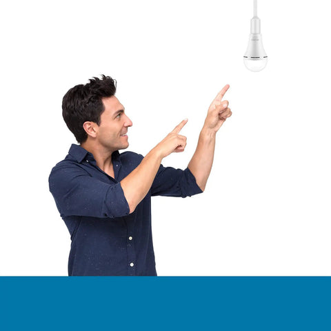 Man pointing at Emergency Rechargeable LED Light Bulb With Hook For Home And Travel Stays Lit During Outages 12W 1200mAh