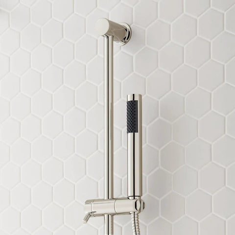 Signature Hardware Gunther 1.8 GPM Pressure Balanced Shower System with hand shower and metal arm on tiled wall.