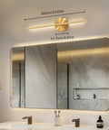 Rechargeable Wireless Wall Sconces Set Of Two 24 Inch gold finish lamp above a bathroom mirror, measuring 60cm.