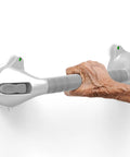 16.5 Inch Suction Bath Grab Bar With Indicators For Balance Help Shower Handle On Flat Non Porous Tiles Silver Grey Secure Grip Easy Install Ideal For Seniors And Rehab Safety In The Shower in use by a hand.