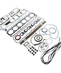 Heavy Duty Full Rebuild Gasket Set For 3126 Engine components laid out, including oil pan, valve cover, and intake gaskets.