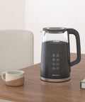 1.7L Dual Wall Electric Tea Kettle With Cool Touch Borosilicate Glass, 304 Stainless Steel Interior, Digital Touchscreen, on table