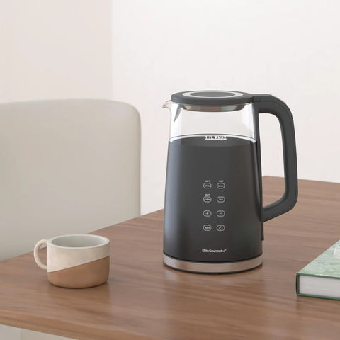 1.7L Dual Wall Electric Tea Kettle With Cool Touch Borosilicate Glass, 304 Stainless Steel Interior, Digital Touchscreen, on table