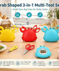 Three magnetic crab-shaped 4-in-1 multi-tool box cutters with bottle opener and mini scissors in yellow, red, and blue on a table.