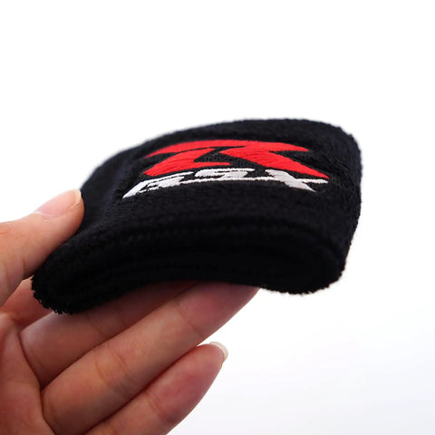 Ride Ready Front Brake Fluid Reservoir Protection Cover And Oil Filler Cap Sock for GSXR 600 750 1000 Motorcycles held in hand.