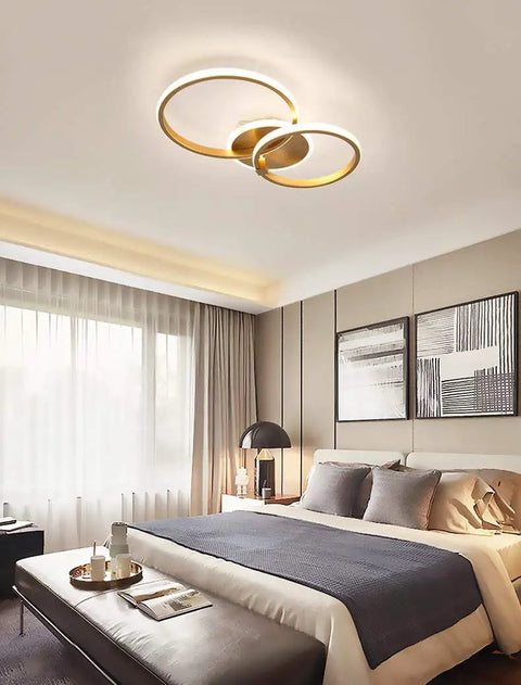 Lit Modern Ring LED Ceiling Light 40W Flush Mount Dual Gold Ring Circles For Living Room Bedroom Kitchen 6000K Cool White With Acrylic Crystal Shade Fixture in a bedroom setting