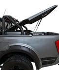 Slick Heavy Duty 75 Pound Gas Strut Lift Support Shock Rod for Truck Tonneau Cover installed on truck bed canopy.