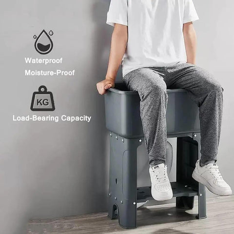 Heavy Duty Freestanding Slop Sink With Built In Storage Shelf For Kitchen Workshop Laundry And Garage Durable PP Material Holds Up To 200kg One Button Drain Black 60x40x76.5cm demonstrating load capacity with seated person