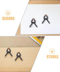 Must-Have 20-Ply Small Spring Clamps Kit For Woodworking And Photography Backdrop Clips Plus Heavy Duty Plastic Cloth Holders Perfect For Crafting, Home Improvement, Studio Work, Office Tasks, And Everyday Organization Adventures. two black plastic spring clamps on paper and wood