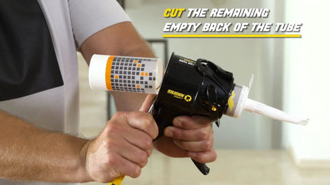 Man using Tiny 4 Inch Caulking Gun No Drip With Patented Design Lightweight ABS Frame Two Pack Fits All 10 Oz Tubes Easy To Store