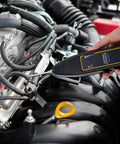 Mechanic using Ultrasonic Leak Detector And Industrial Stethoscope For Engines Bearings Valves Pumps And Pipes High Sensitivity.