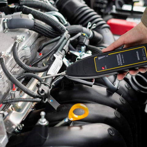 Mechanic using Ultrasonic Leak Detector And Industrial Stethoscope For Engines Bearings Valves Pumps And Pipes High Sensitivity.