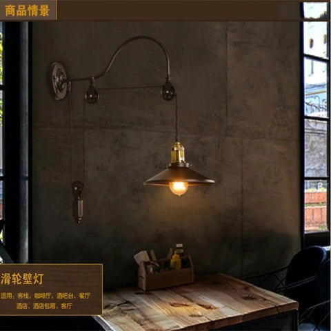Dope Vintage Wall Sconce Featuring Classic Wrought Iron Build With Handsome Pulley Adjustment For Slick Loft Rooms And Chill Bar Decor That Seriously Slays And Looks Absolutely Lit, mounted on a textured wall.