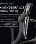 Close-up of Shimano Dura-Ace 9270 Di2 shifter on Di2 Full Carbon Road Bike With Ultra Light Frame And 24 Speed Shimano R9270 Groupset Hydraulic Disc Brakes Pro Grade Racing Carbon Bicycle For Adults Ultra Stiff Climb Ready 50cm Black