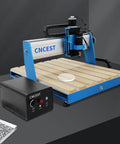 Heavy Hitting 3 Axis CNC Router Machine With 500W Air Cooled Spindle for precise carving on wooden surface and control unit.