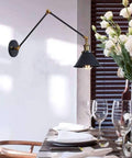 Badass Industrial Swing Arm Wall Sconce Adjustable Metal Light Fixture E27 Socket illuminating a dining table setting.