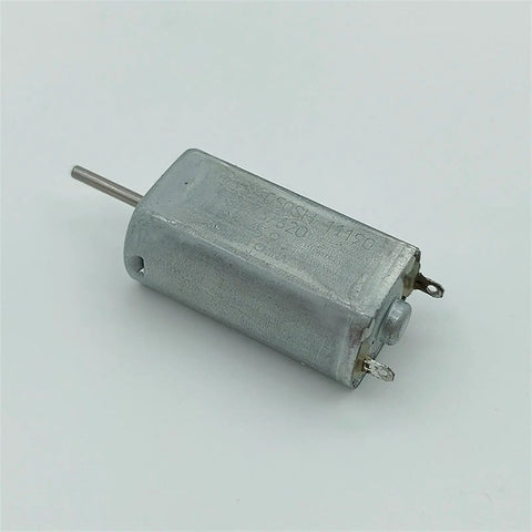 Mini 050 DC Motor 15mm Micro Electric Motor With Precious Metal Brush Runs On 3V 5V 6V Or 9V Great For Budget Friendly Tiny Robotics And RC Projects Smooth Performance One Piece, side view showcasing compact design and metallic housing.
