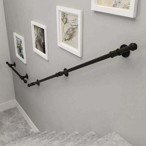 Built Like A Tank Wall Mount Handrail Stair Railing Bracket Complete Black Wrought Iron Kit Outdoor Indoor Step Support 19 Foot Long installed on wall next to art frames.