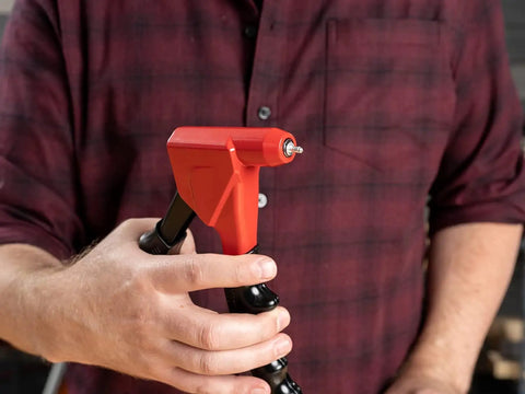 Person holding Headless One Handed Rivet Tool Kit For Metal Fabric Leather And Auto Repair Manual Riveter Set.