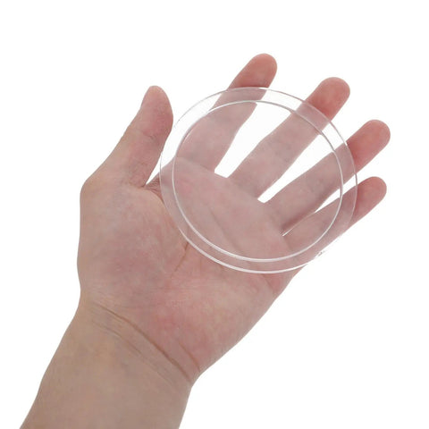 Hand holding KT6808 Compatible Jewelry Tumbler Lid Transparent Round Barrel Cover for Jewelry Polisher and Rock Tumbler Cleaning Tasks