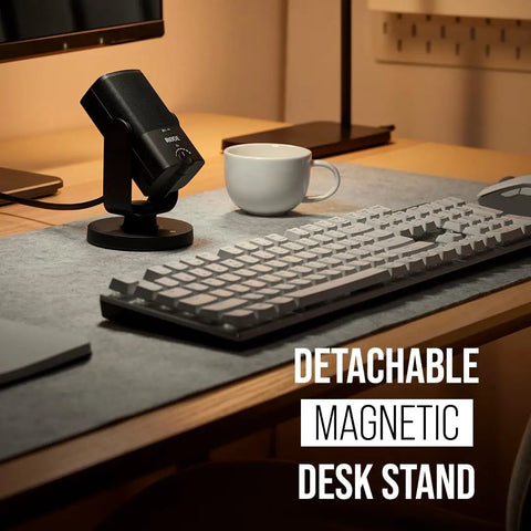 NT-USB Mini Condenser USB Microphone on desk with keyboard and cup, featuring detachable magnetic desk stand