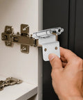 Hand installing Eight Pack Three Eighths Inch Flush Mount Inset Cabinet Hinges Brushed Nickel Self Closing Kitchen Cupboard Doors