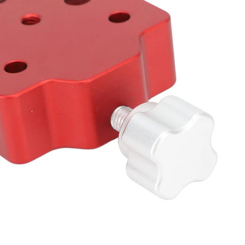 Close-up of Rugged Aluminum Dovetail Clamp for Telescopes and Camera Rigs with bubble level, showing mounting holes and knob.