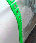 Green Magnetic Edge Protection Strip for Cars and Auto Detailing on car body for safe scratch prevention and precise finishing.