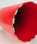 Side view of a red 10-inch diamond core drill bit with segmented diamond edge.
