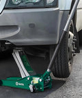 Green 3 Ton Hydraulic Floor Jack under vehicle, used for lifting, demonstrating the Heavy Duty Steel Return Springs For Horizontal Jack Handle Replacement Parts Torque Reset Spring Set 4 Pack Durable DIY Mechanic Upgrade Ideal For DIY Enthusiasts