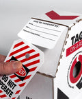 All Weather Lockout Tags On A Roll Built Tough As Nails for Rough Job Sites with Do Not Operate labels and roll dispenser.