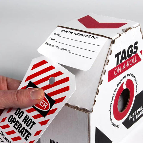 All Weather Lockout Tags On A Roll Built Tough As Nails for Rough Job Sites with Do Not Operate labels and roll dispenser.