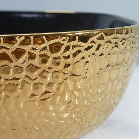 USZWBY Vessel Sinks Ceramic Vessel Sink Light Luxury Household Single Basin Art Bathroom Countertop Wash Bathroom Bowl Sink in gold finish with textured design.