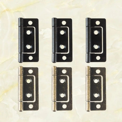 Six Pack Thickened Flat Door Hinges With Silent Operation in black and bronze, set of six, on a flat marble surface.