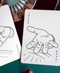 Premium Roulette Casino Playing Cards Crafted For Magicians And Card Sharks Featuring Dope Vintage Graphics, showing two joker cards with hand illustrations.