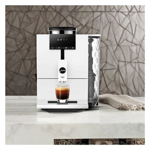 Lock In The Ultimate Morning Perk Up With This Factory Refurbished Automatic Coffee Machine In Sharp Nordic White on countertop.