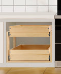 Premium Two Tier Pull Out Cabinet Organizer Featuring Ball Bearings And Smooth Glide Slide Out Drawer For No Sweat Assembly Tons Of Room Under Counter Kitchen Pantry Storage Solution Fits 17 Wide with wooden drawers.