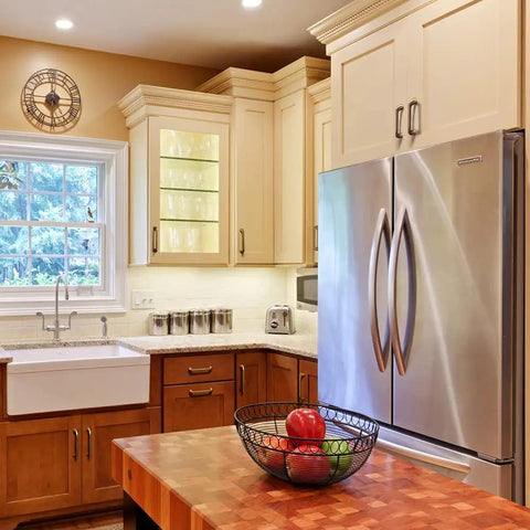 Modern kitchen with stainless steel appliances and wood cabinetry featuring Antique Brass 6 Pack 5 Inch Center To Center Cabinet Handles Retro Drawer Pulls Vintage Kitchen Hardware Mid Century Modern Dresser Bar Pulls Casual Luxury.