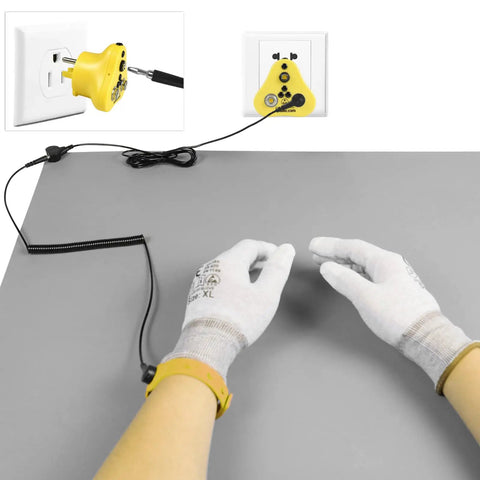 Hands wearing gloves on 30x24 Inch ESD Rubber Mat With Grounding Kit For PC Building And Electronics Repair Anti Static Table Pad Solder Work Wrist Strap Cord Gloves Included Grey, grounding plug shown