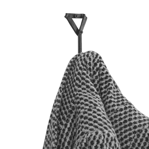 Heavy Duty Wrought Iron Coat Hook With A Distressed Bronze Look Hand Forged Wall Mount Rack Built Tough Rust Proof Construction hanging a black and white checked throw