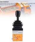 Proportional Dump Truck Valve With Three Holes And Two Working Positions, PTO Switch in front of an orange dump truck