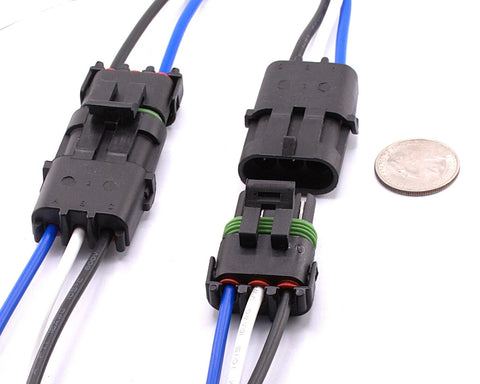 Front view of a pair of 3-pin waterproof automotive connectors with locking latch; black housings and blue/black/white wires.
