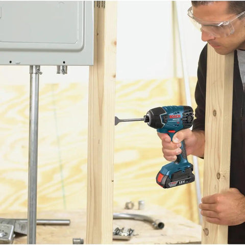 Person using Compact 18V One Quarter Inch Hex Impact Driver Bare Tool With Built In LED Light And Electronic Cell Protection